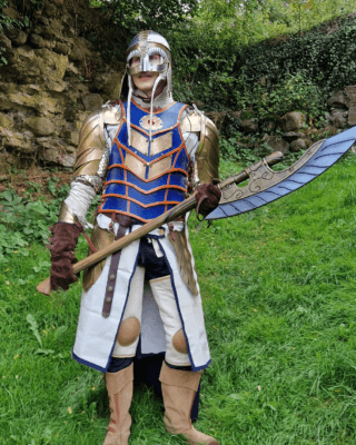 Student in blue and white fantasy armor